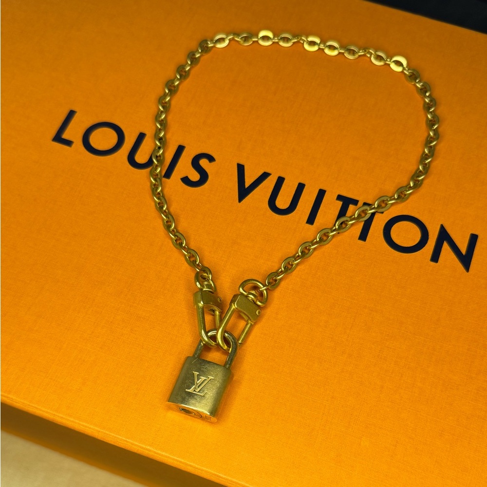 LV lock necklace